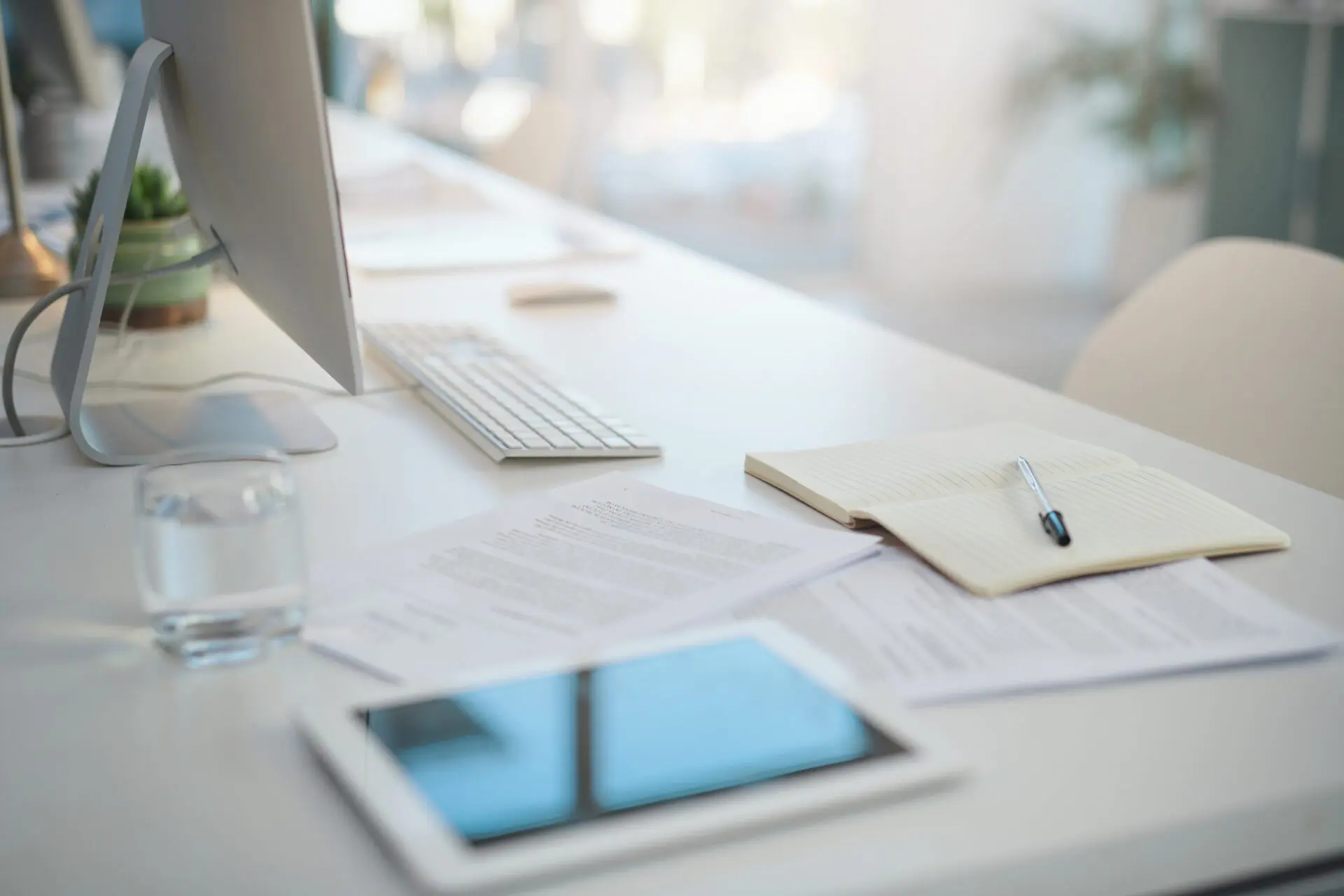 Image of ladies with paperwork